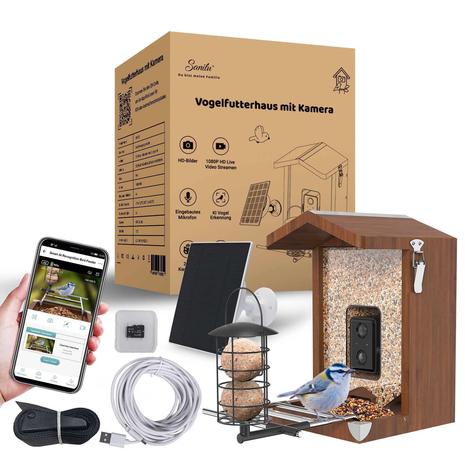 Vogelfutterhaus mit eingebauter Kamera (sichtbare Kameralinse) in Holzoptik, Innenseite mit Körnern, Solarpanel, Montagehalterung, Meisenknödelhalter, USB-Kabel, Befestigungsband, Smartphone mit Live-Ansicht und Produktverpackung